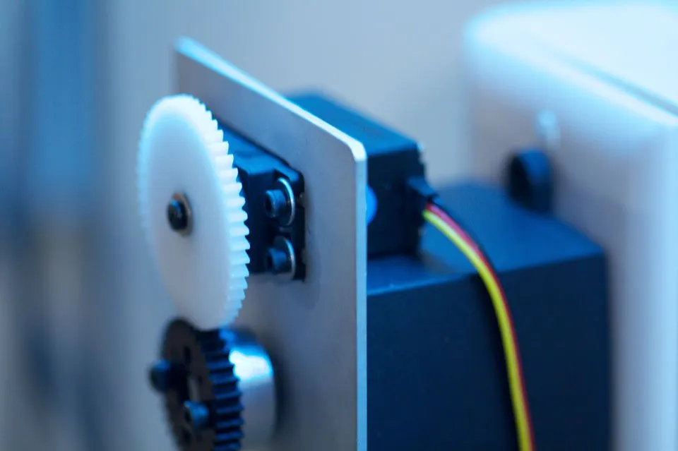 Close-up of servo controlled neon dimmer